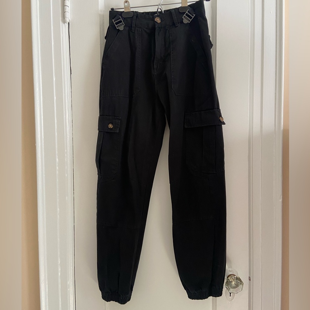 Pull&Bear cargo pants with side buckle detail.